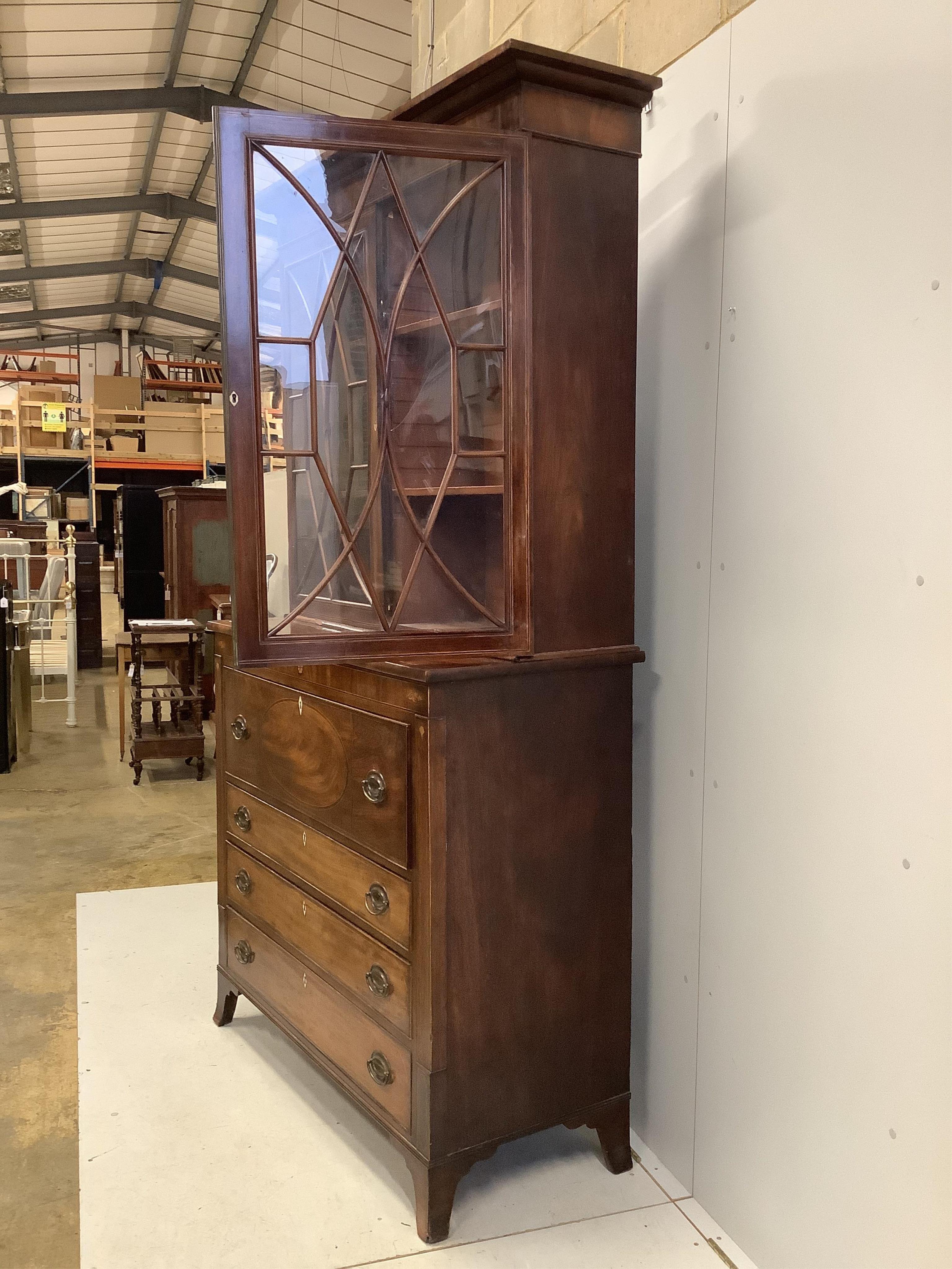 A George III mahogany secretaire bookcase, width 120cm, depth 53cm, height 224cm. Condition - fair